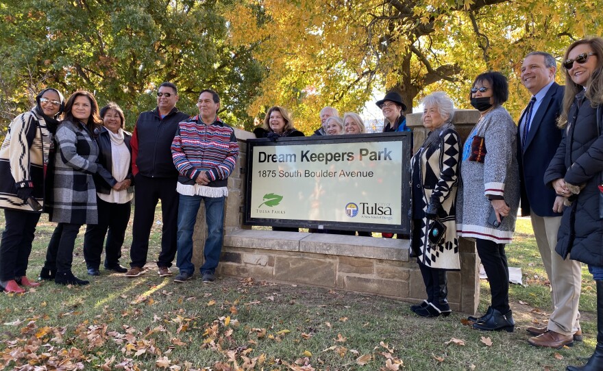 Tribal and City of Tulsa leaders at the dedication of Dream Keepers Park, gathered around the new park sign.